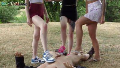 CFNM outdoor British babes wank cock in group HJ action - hotmovs.com - Britain