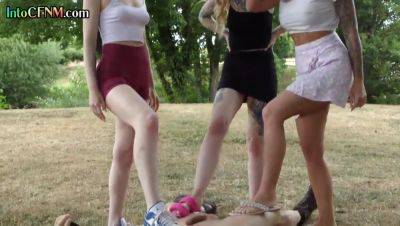 CFNM outdoor British babes wank cock in group HJ action - txxx.com - Britain