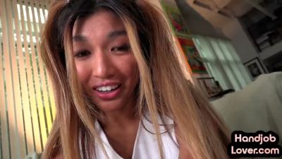 Asian cheerleader in purple skirt gives a passionate POV blowjob in the living room - yesvids.com